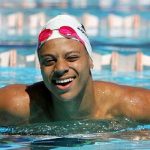 Record Breaking Michael Wins Gold, Sets Sights on Olympics