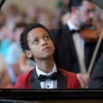Pianist, Qden, Becomes First African Invited to Prestigious Masterclass in Germany